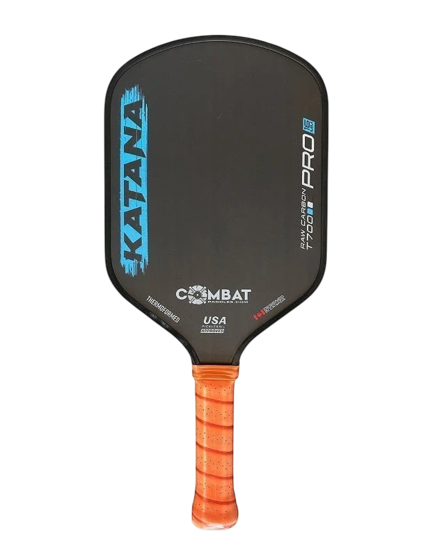 Pickleshop Combat Katana Raw Carbon Pro pickleball paddle with blue lettering and orange grip. USA Pickleball approved.