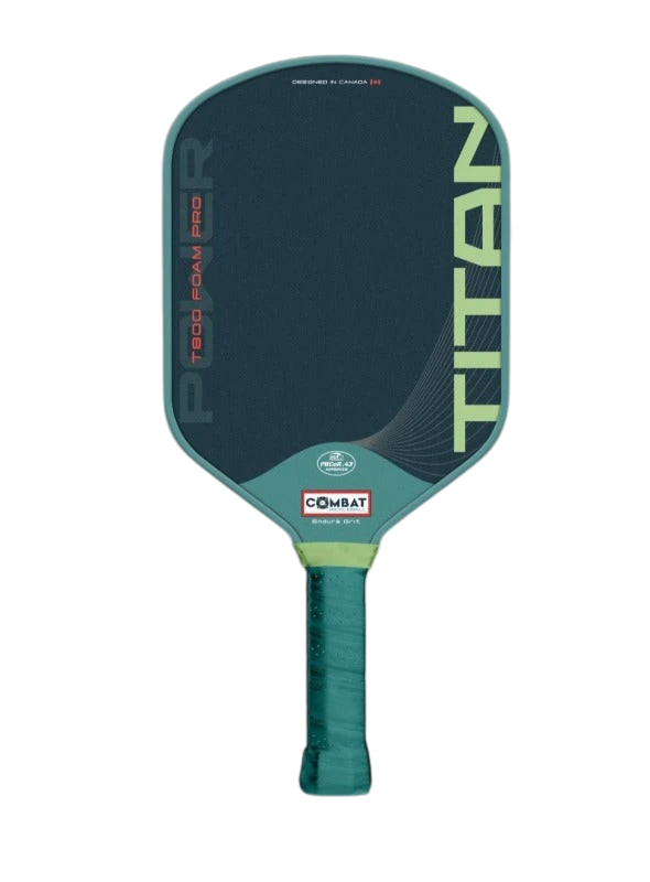 Pickleshop Combat Titan Foam Pro pickleball paddle with dark blue T800 raw carbon surface and teal trim.